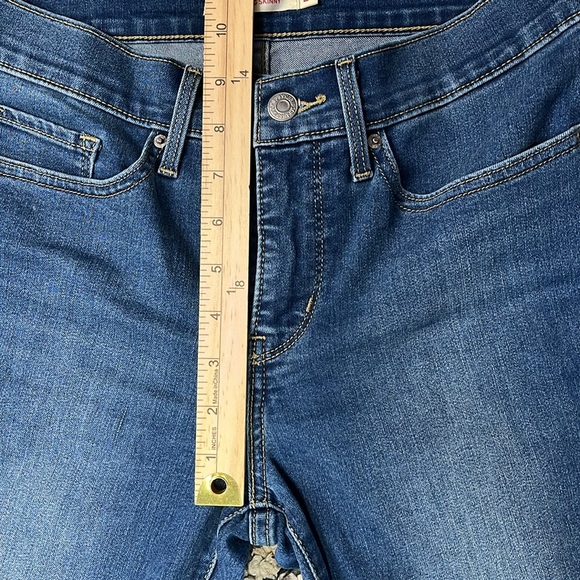 Levi’s 311 Shaping Skinny Medium Wash Stretchy Jeans Mid Rise Slimming Size 27 - Picture 8 of 9